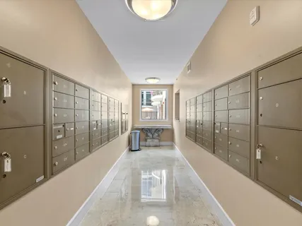 a large white building with glass door