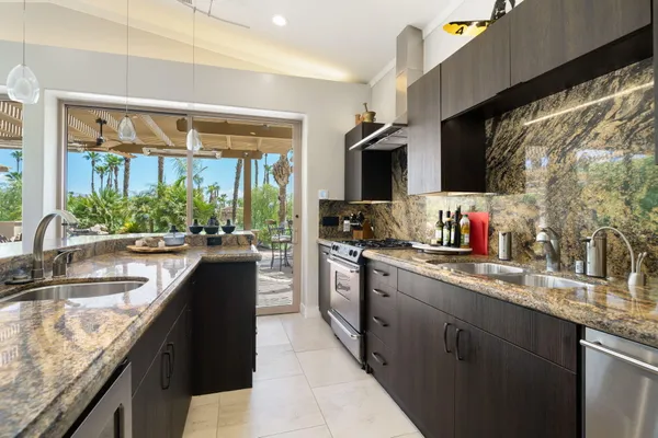 a bathroom with a bathtub sink and mirror