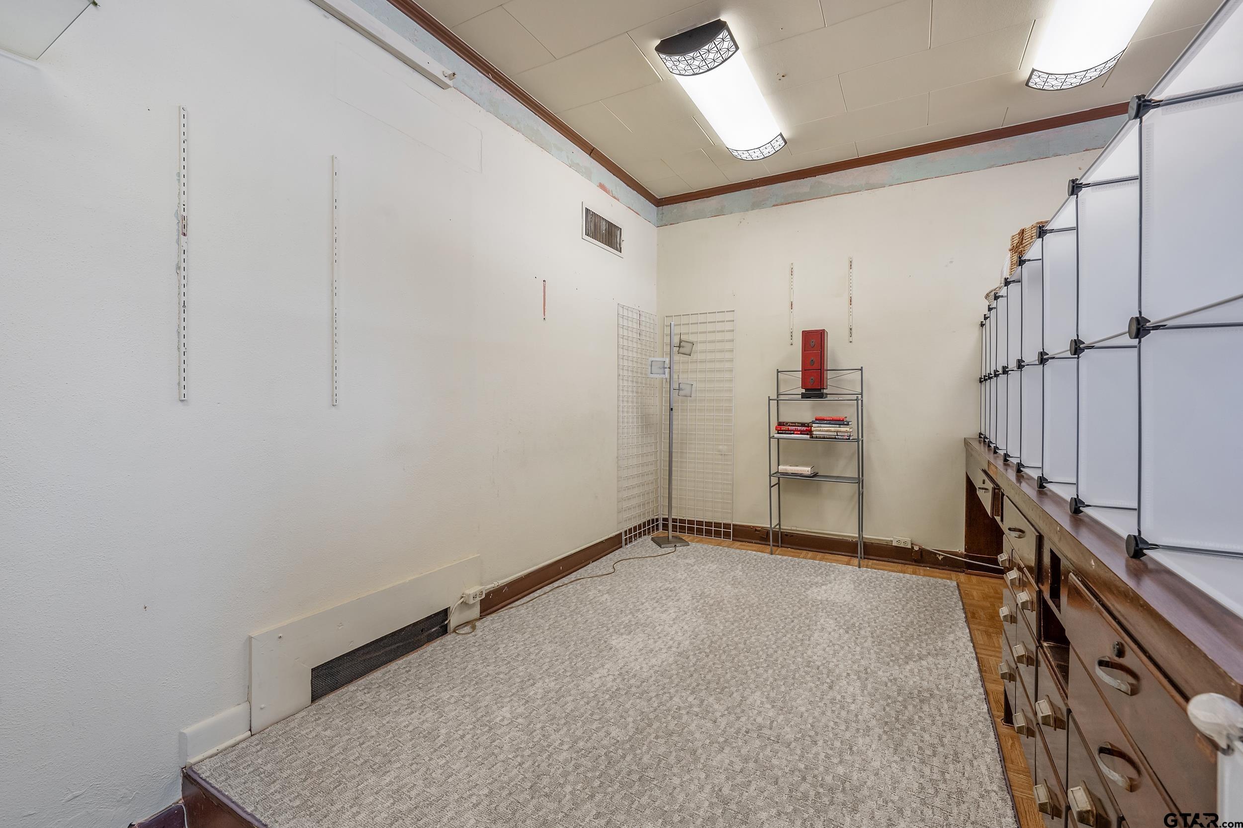 129 West 6th Street Rusk, TX 75785 - Photo 8 of 12 a view of empty room with stairs