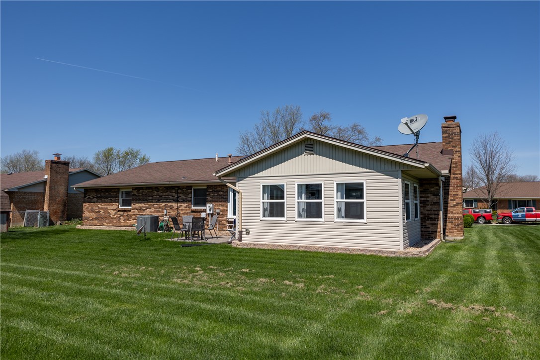 4210 Pleasanton Road Englewood, OH 45322 - Photo 30 of 34 This spacious backyard offers a private oasis for outdoor living and entertaining.