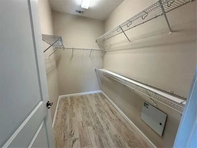 a view of a room with racks on the wall