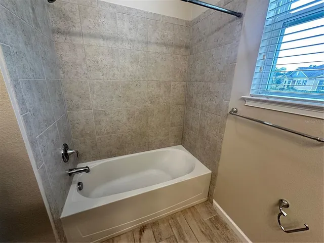 a bathroom with a bathtub