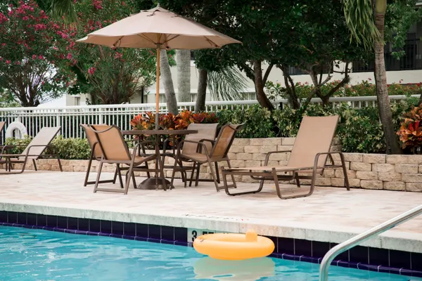 a view of a swimming pool with a patio