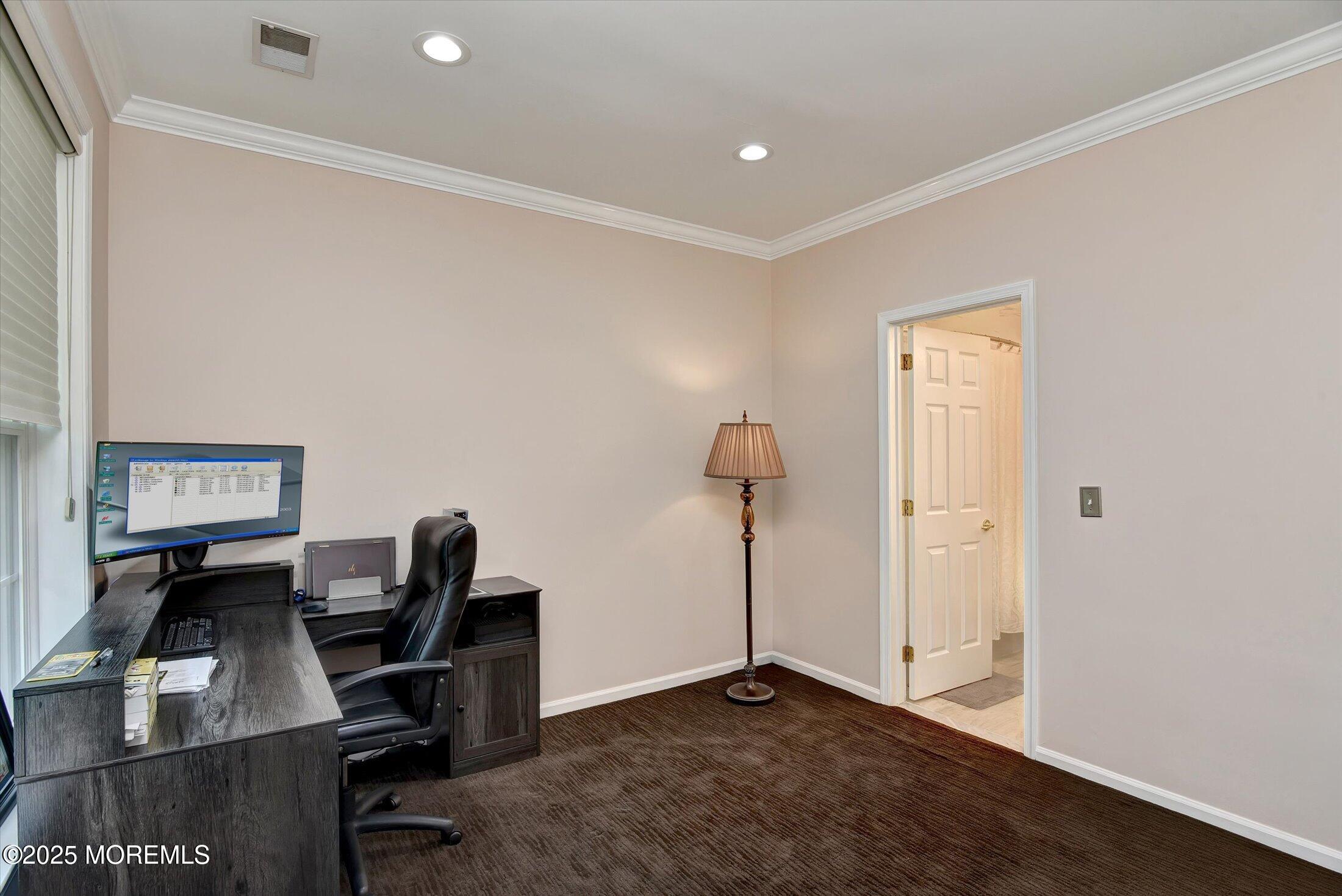 594 St Andrews Place Manalapan, NJ 07726 - Photo 21 of 35 a view of a workspace with furniture