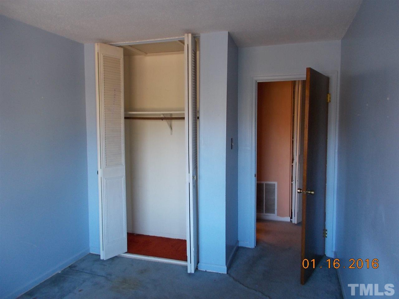 4313 Lake Ridge Drive, Unit 9E Raleigh, NC 27604 - Photo 11 of 16 a view of elevator with hallway