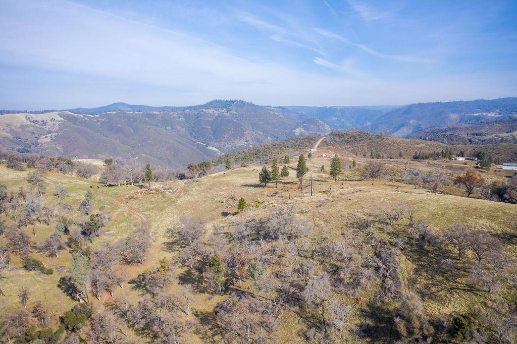 11111 State Rte 26 Mokelumne Hill, CA 95245 - Photo 7 of 22 a view of a dry field with mountains in the background