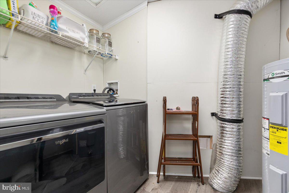 1501 South Timber Ridge Road Cross Junction, VA 22625 - Photo 18 of 66 a utility room with dryer and washer