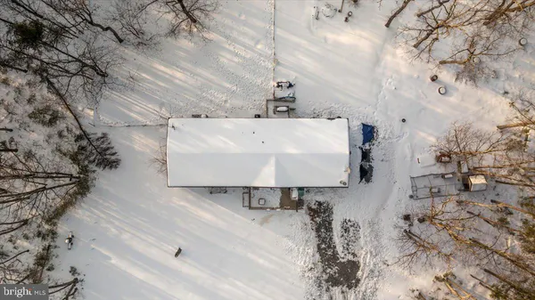a view of a backyard with sitting area
