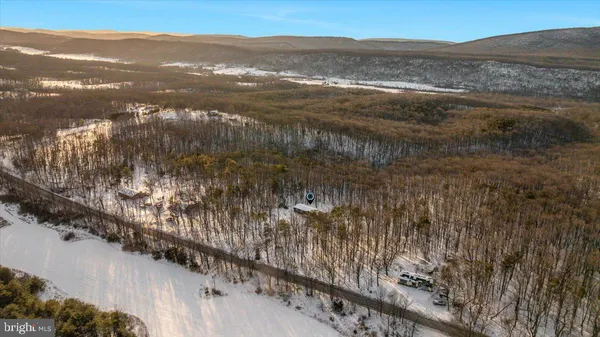 a view of a outdoor space with mountain view