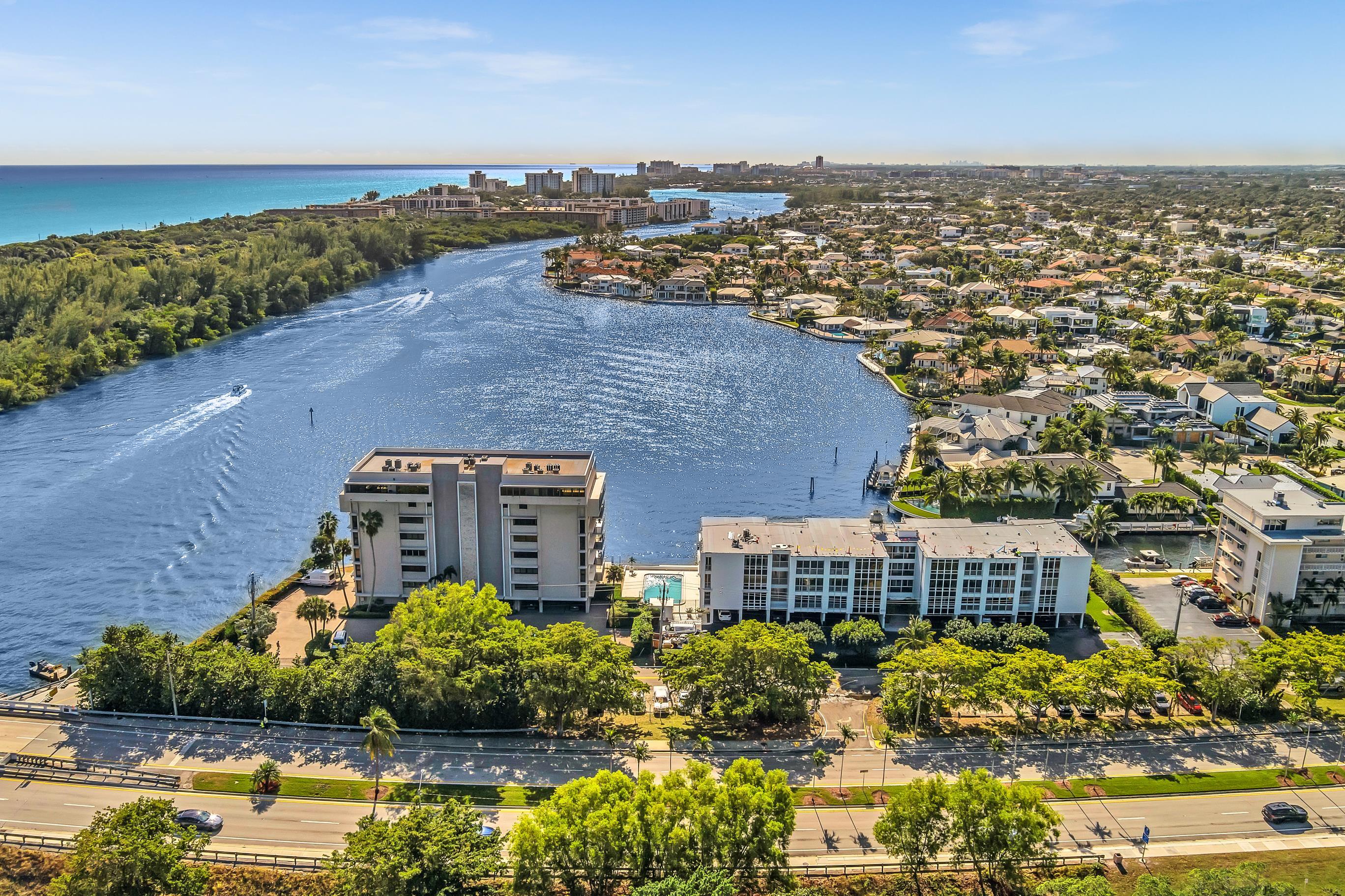 900 Northeast Spanish River Boulevard, Unit 4E Boca Raton, FL 33431 - Photo 25 of 26 an aerial view of a house with a lake view