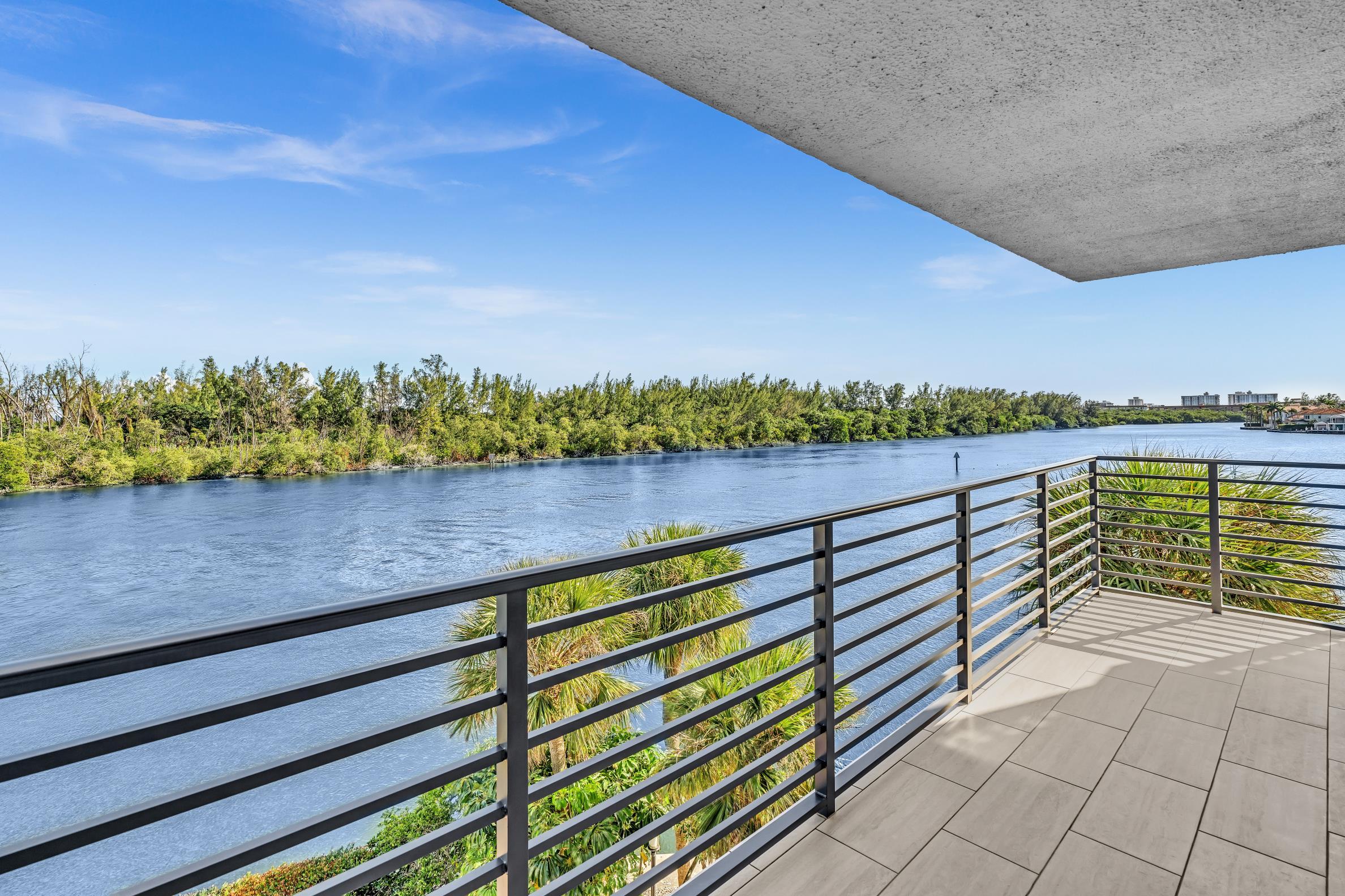 900 Northeast Spanish River Boulevard, Unit 4E Boca Raton, FL 33431 - Photo 4 of 26 a view of a lake with outdoor space