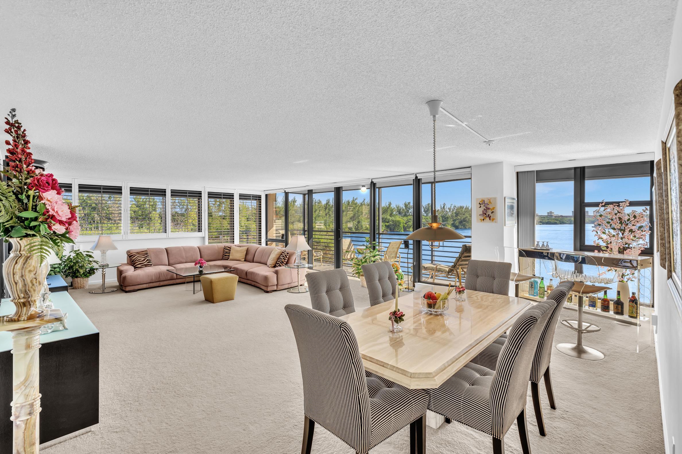 900 Northeast Spanish River Boulevard, Unit 4E Boca Raton, FL 33431 - Photo 26 of 26 a view of a dining room with furniture window and outside view