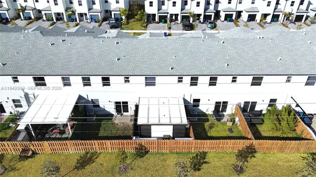 a view of swimming pool with outdoor seating