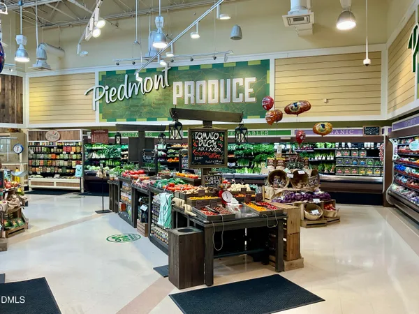 a view of a car park in front of building