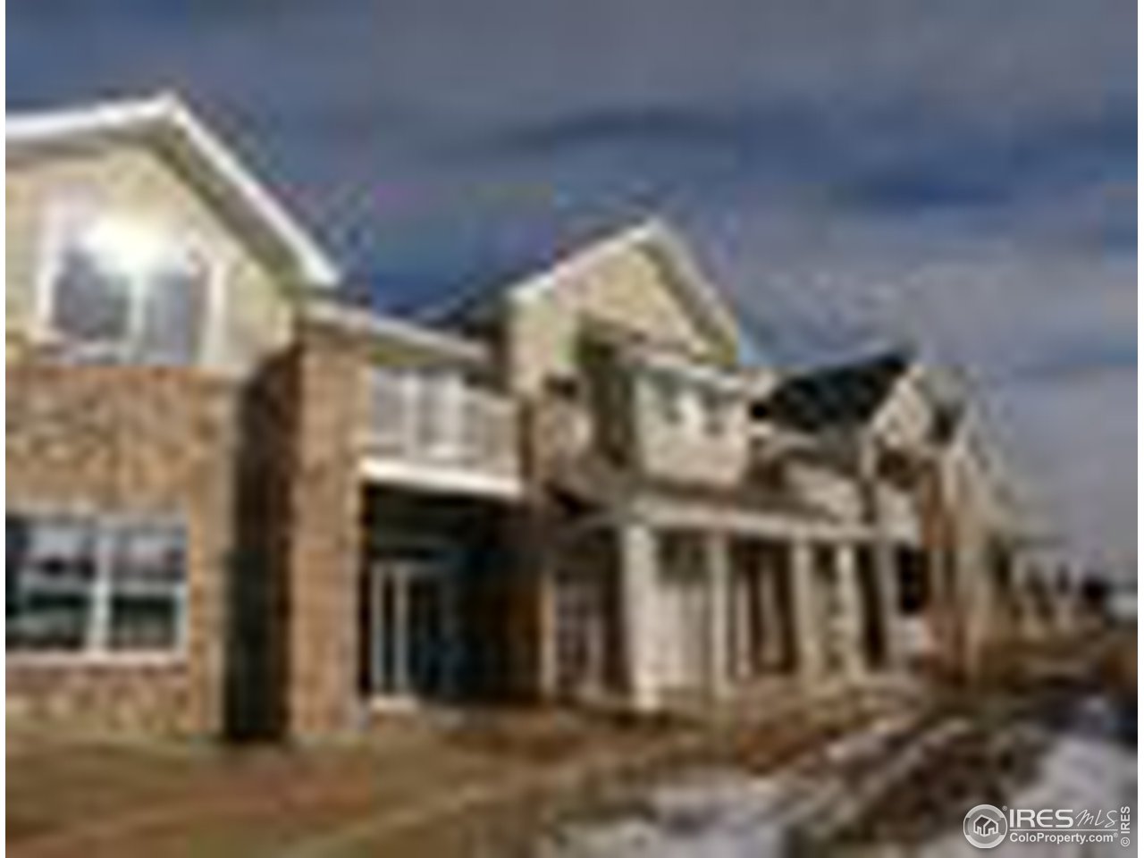 10818 Cimarron Street, Unit 202 Firestone, CO 80504 - Photo 1 of 1 a view of building