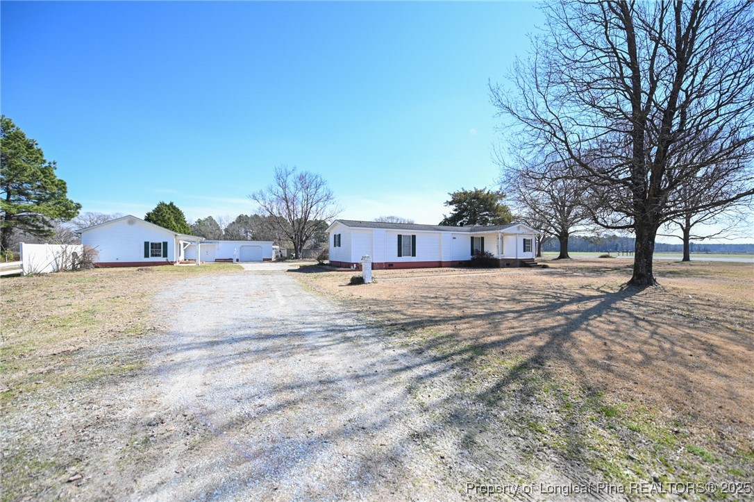 1283 Savannah Hill Road Dunn, NC 28334 - Photo 1 of 50 Gallery Image 1