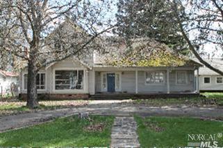 1000 Center Valley Road Willits, CA 95490 - Photo 1 of 1 a front view of a house with a garden