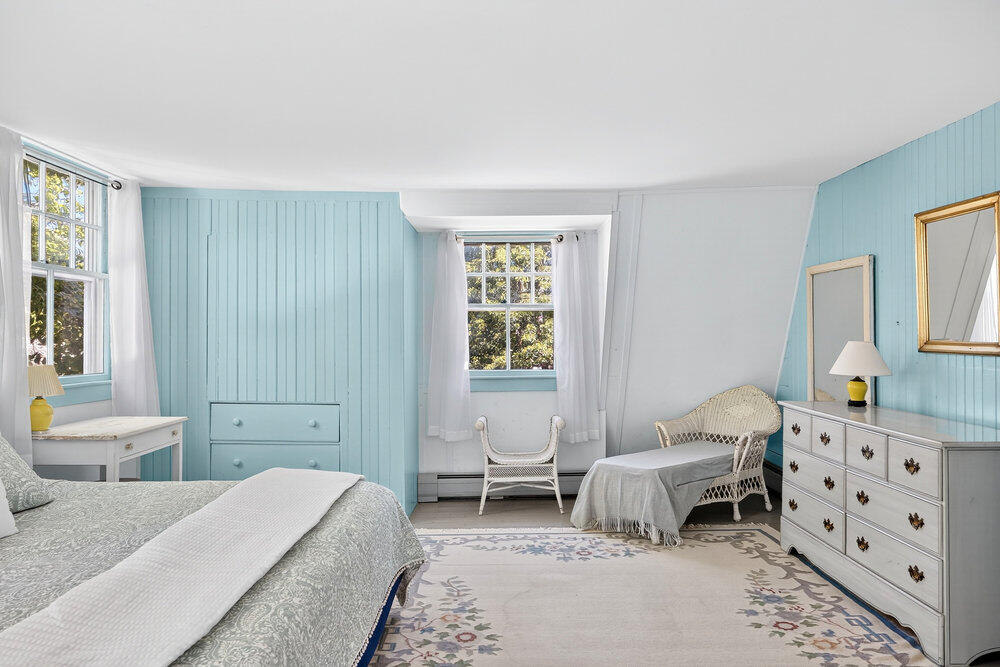 250 Scraggy Neck Road Cataumet, MA 02534 - Photo 21 of 86 a bedroom with a bed and a window