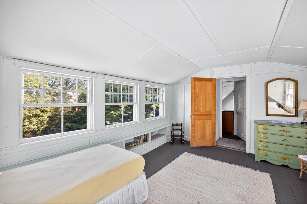 250 Scraggy Neck Road Cataumet, MA 02534 - Photo 26 of 86 a bedroom with a bed and with windows