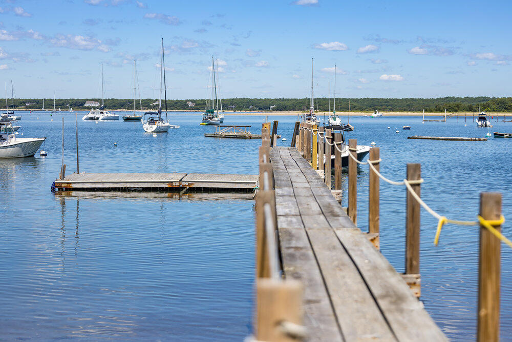 250 Scraggy Neck Road Cataumet, MA 02534 - Photo 59 of 86 a view of a living room with furniture