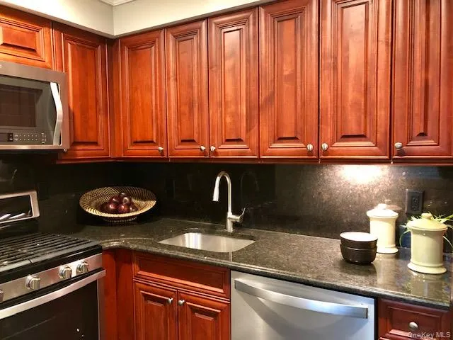 a kitchen with lots of counter space and a sink