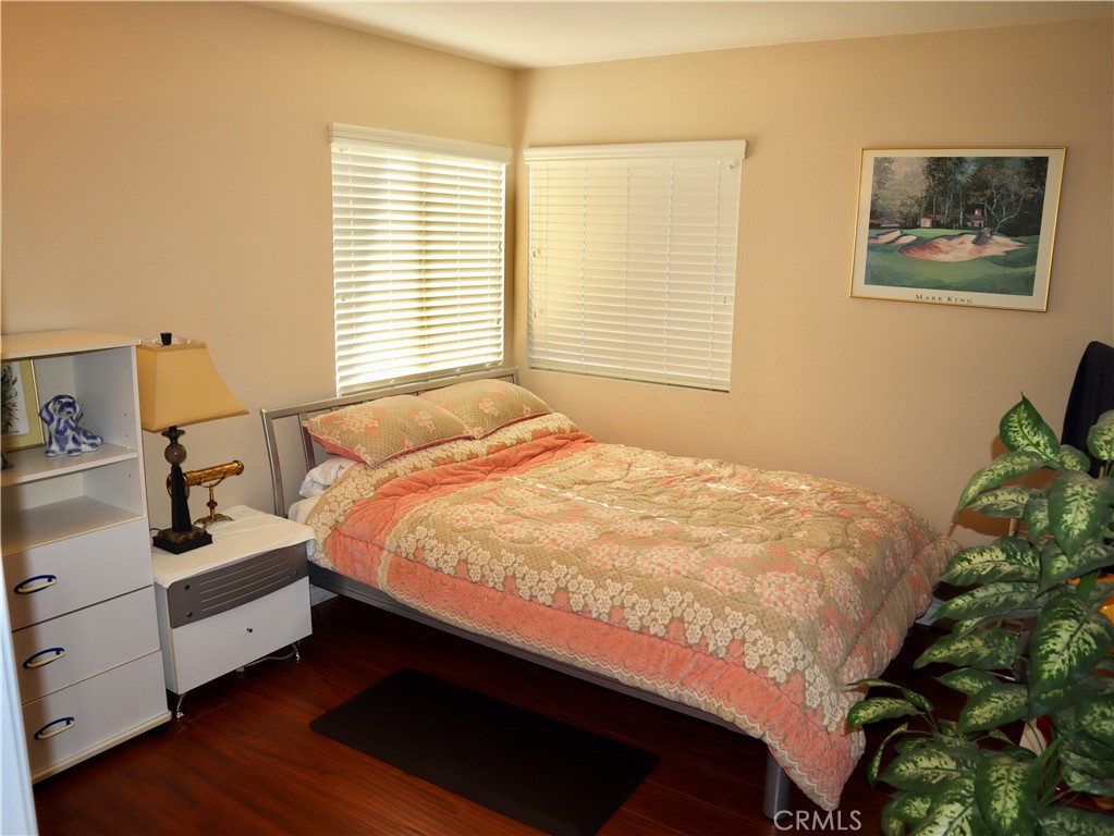 21475 Dickinson Road Moreno Valley, CA 92557 - Photo 27 of 41 a bed sitting in a bedroom next to a window