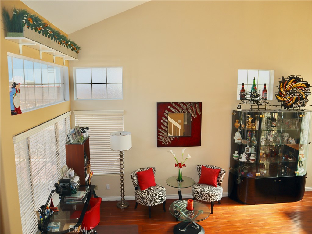 21475 Dickinson Road Moreno Valley, CA 92557 - Photo 31 of 41 a living room with furniture and a wooden floor