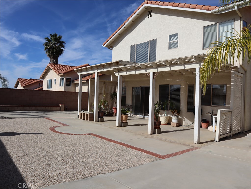 21475 Dickinson Road Moreno Valley, CA 92557 - Photo 34 of 41 a view of a house with a patio