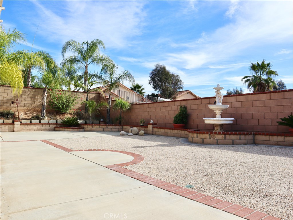 21475 Dickinson Road Moreno Valley, CA 92557 - Photo 39 of 41 a view of a house with a yard and sitting area