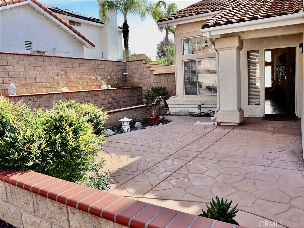 21475 Dickinson Road Moreno Valley, CA 92557 - Photo 6 of 41 a view of a bench in the back yard of a house