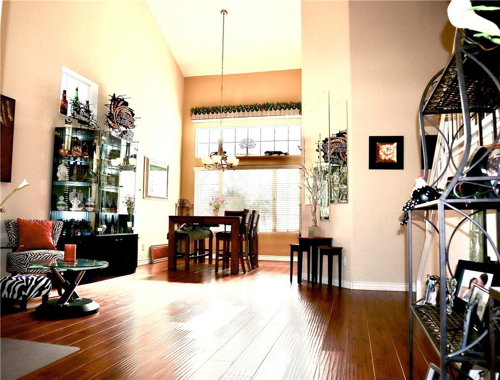 21475 Dickinson Road Moreno Valley, CA 92557 - Photo 7 of 41 a view of a livingroom with furniture window and wooden floor