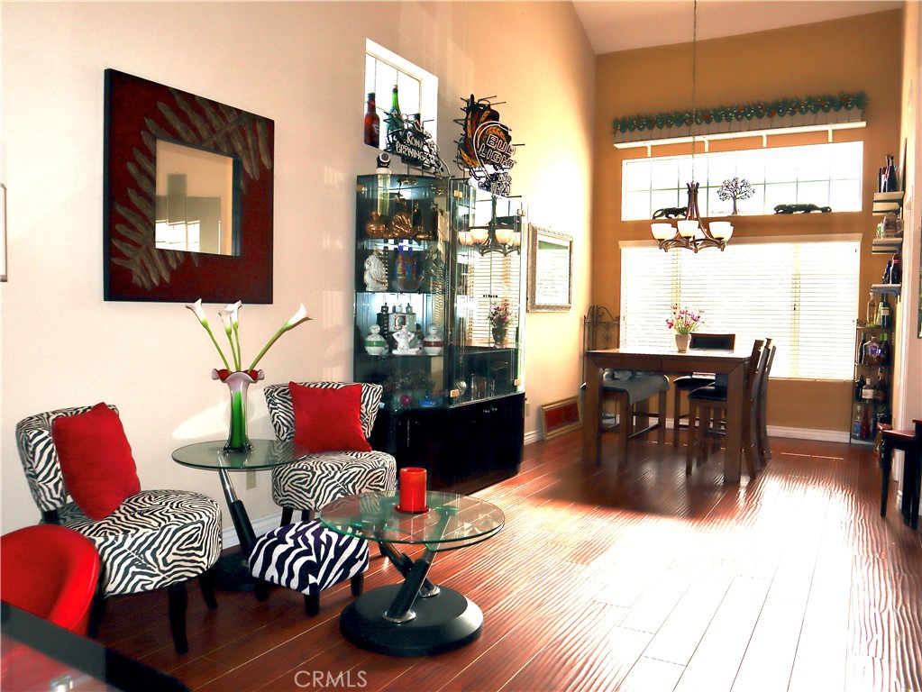 21475 Dickinson Road Moreno Valley, CA 92557 - Photo 8 of 41 a living room with furniture and wooden floor