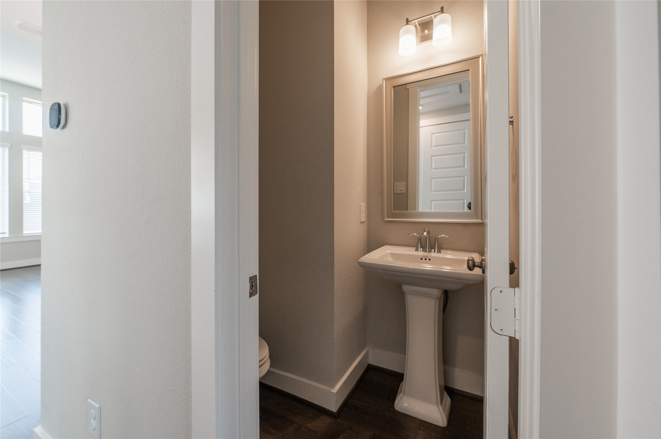 963 Lilly Flower Lane Houston, TX 77091 - Photo 18 of 28 Half bath on the second floor