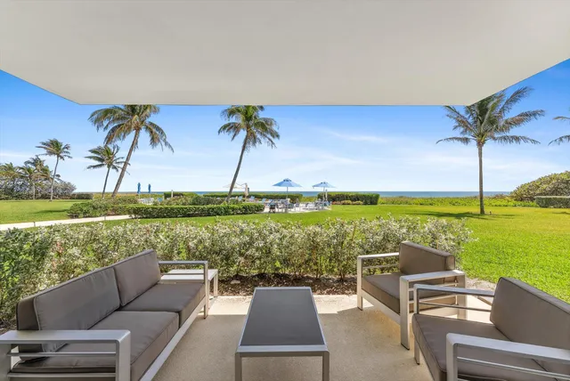 a view of a terrace with couches and a table