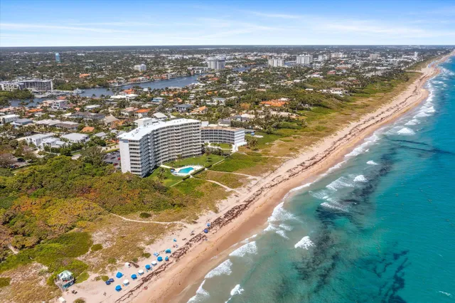 a view of a swimming pool and an ocean view