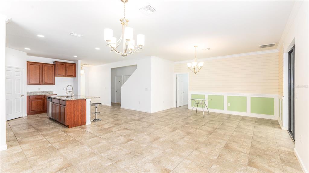 1723 Musgrass Circle Melbourne, FL 32904 - Photo 11 of 31 a view of kitchen with a sink and a large window