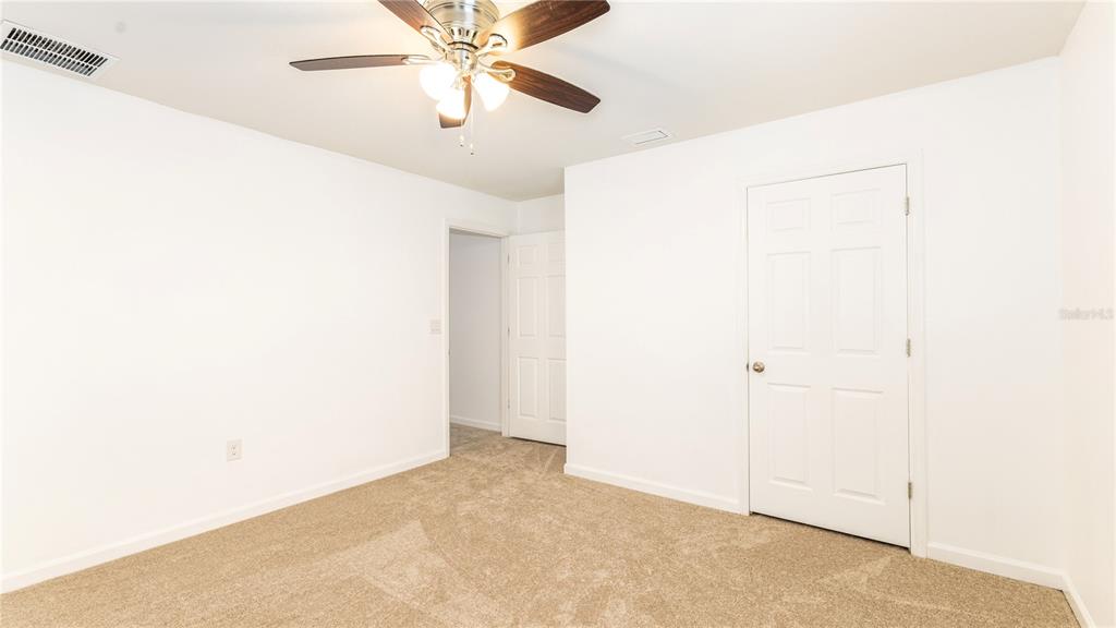 1723 Musgrass Circle Melbourne, FL 32904 - Photo 19 of 31 a view of an empty room
