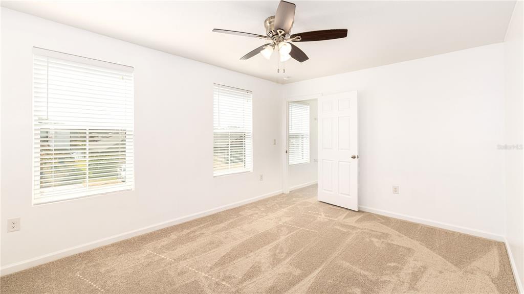 1723 Musgrass Circle Melbourne, FL 32904 - Photo 25 of 31 a view of an empty room with a window