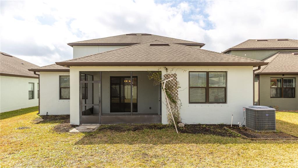 1723 Musgrass Circle Melbourne, FL 32904 - Photo 27 of 31 a front view of a house