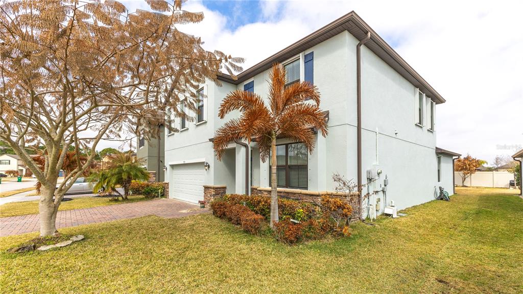 1723 Musgrass Circle Melbourne, FL 32904 - Photo 31 of 31 a view of a house with a yard covered in snow