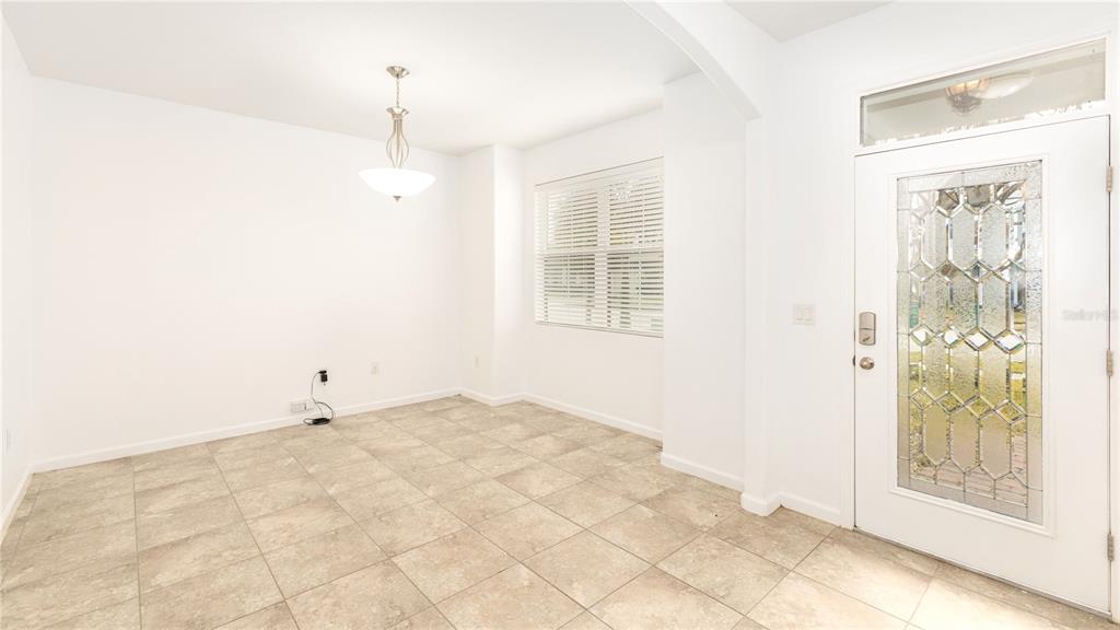 1723 Musgrass Circle Melbourne, FL 32904 - Photo 4 of 31 a view of wooden floor in an empty room