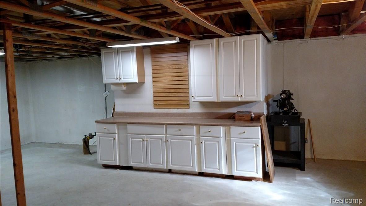 3124 Fairgrove Terrace, Unit 67 Rochester, MI 48309 - Photo 43 of 46 Basement storage cabinets