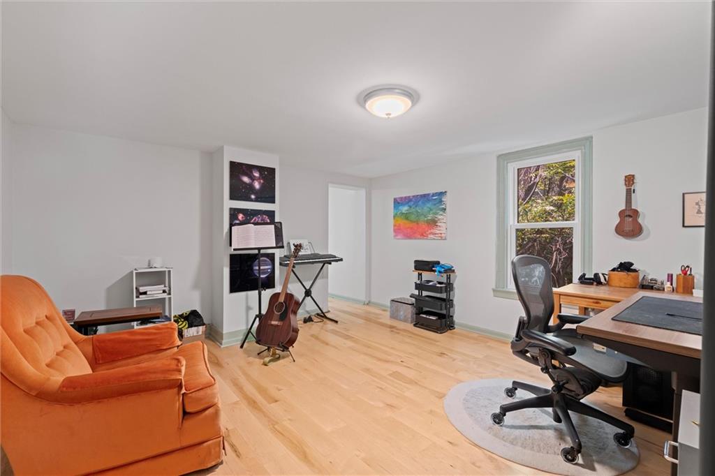 520 Knoll Street Pittsburgh, PA 15212 - Photo 25 of 47 a view of a workspace with furniture and a window