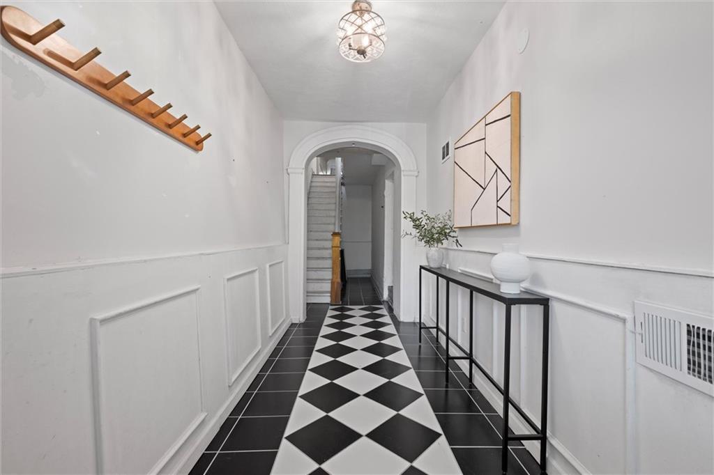 520 Knoll Street Pittsburgh, PA 15212 - Photo 30 of 47 a bathroom with a double vanity sink and mirror
