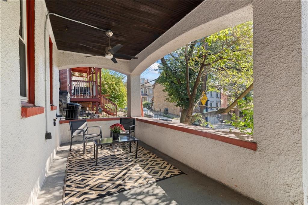 520 Knoll Street Pittsburgh, PA 15212 - Photo 36 of 47 a room with wooden floor and furniture