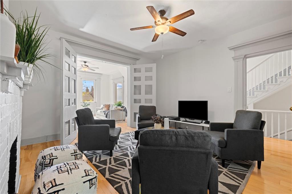 520 Knoll Street Pittsburgh, PA 15212 - Photo 6 of 47 a view of a livingroom with workspace and a couch