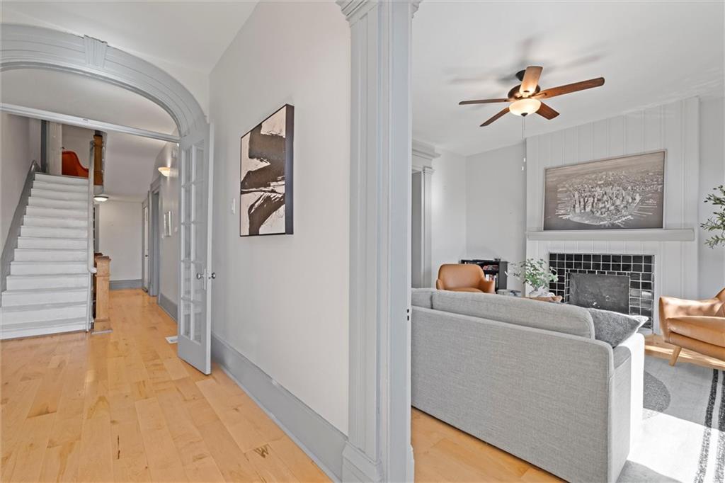 520 Knoll Street Pittsburgh, PA 15212 - Photo 9 of 47 a living room with furniture and a chandelier