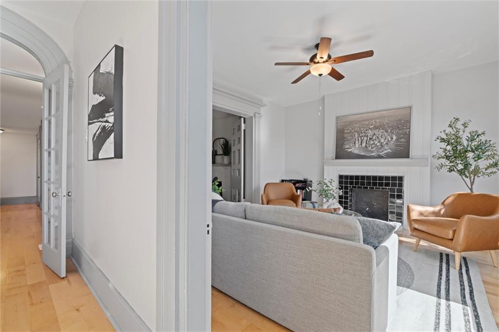 520 Knoll Street Pittsburgh, PA 15212 - Photo 10 of 47 a living room with furniture and a fireplace