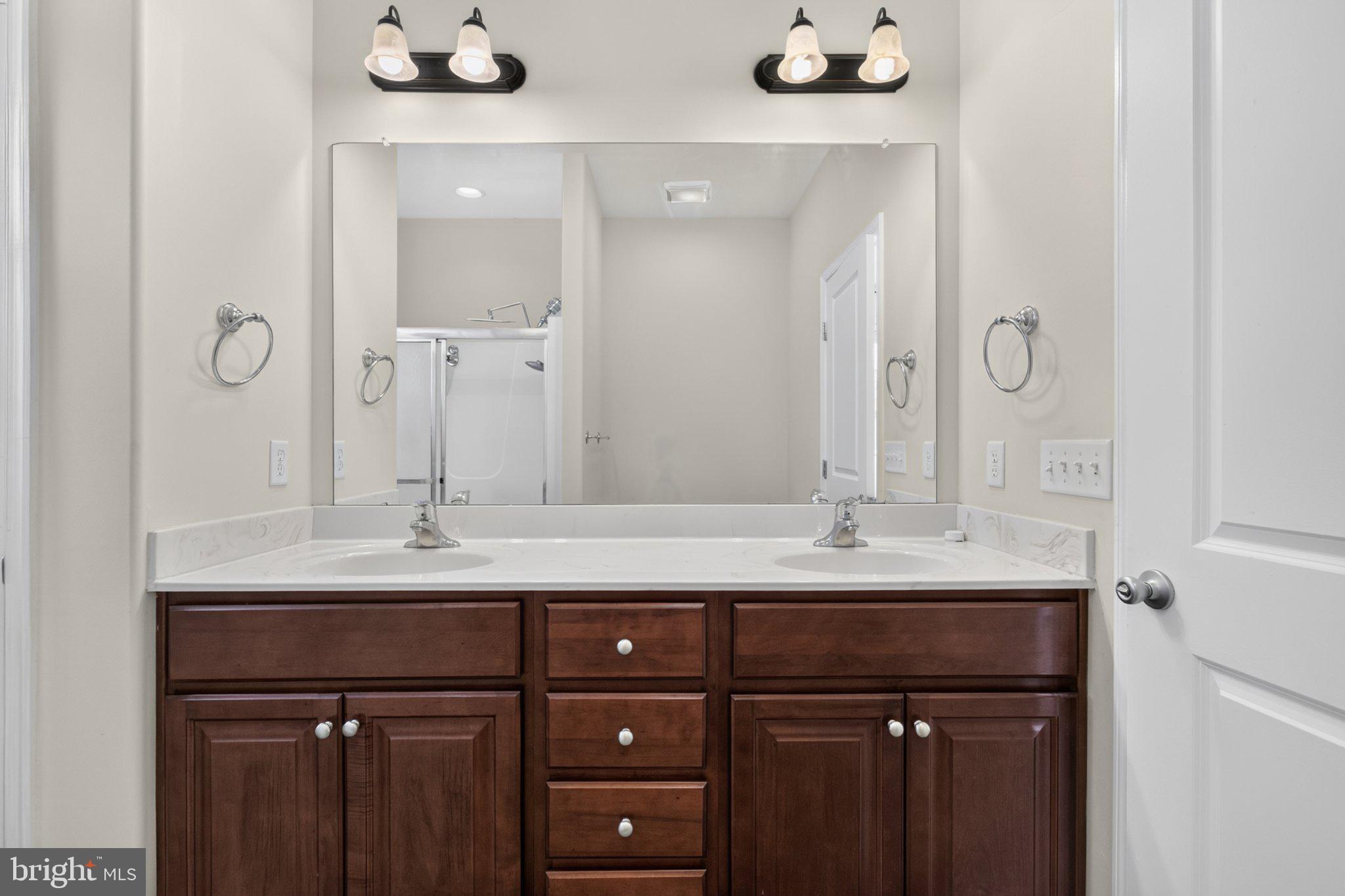 27 Sun Ridge Drive Felton, DE 19943 - Photo 33 of 61 Elegant dual-sink bathroom oasis.