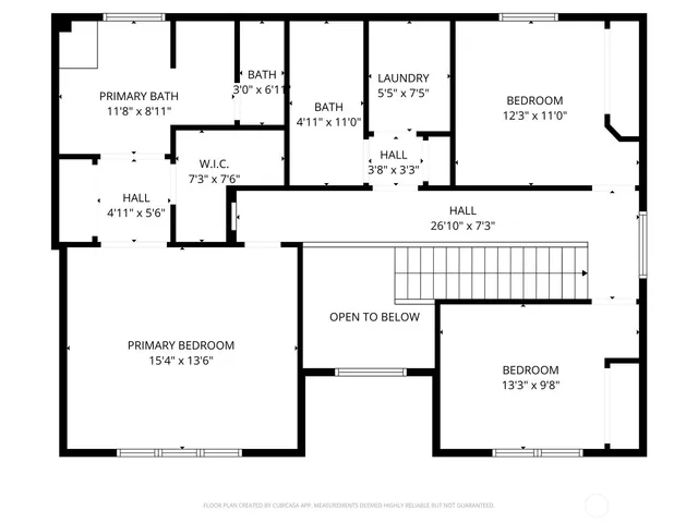 a picture of a bench in front of gate